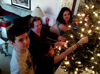 Helping grandma trim her Christmas tree 2011